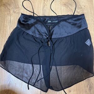 Zara medium top, bottom half is see through top is satin in black